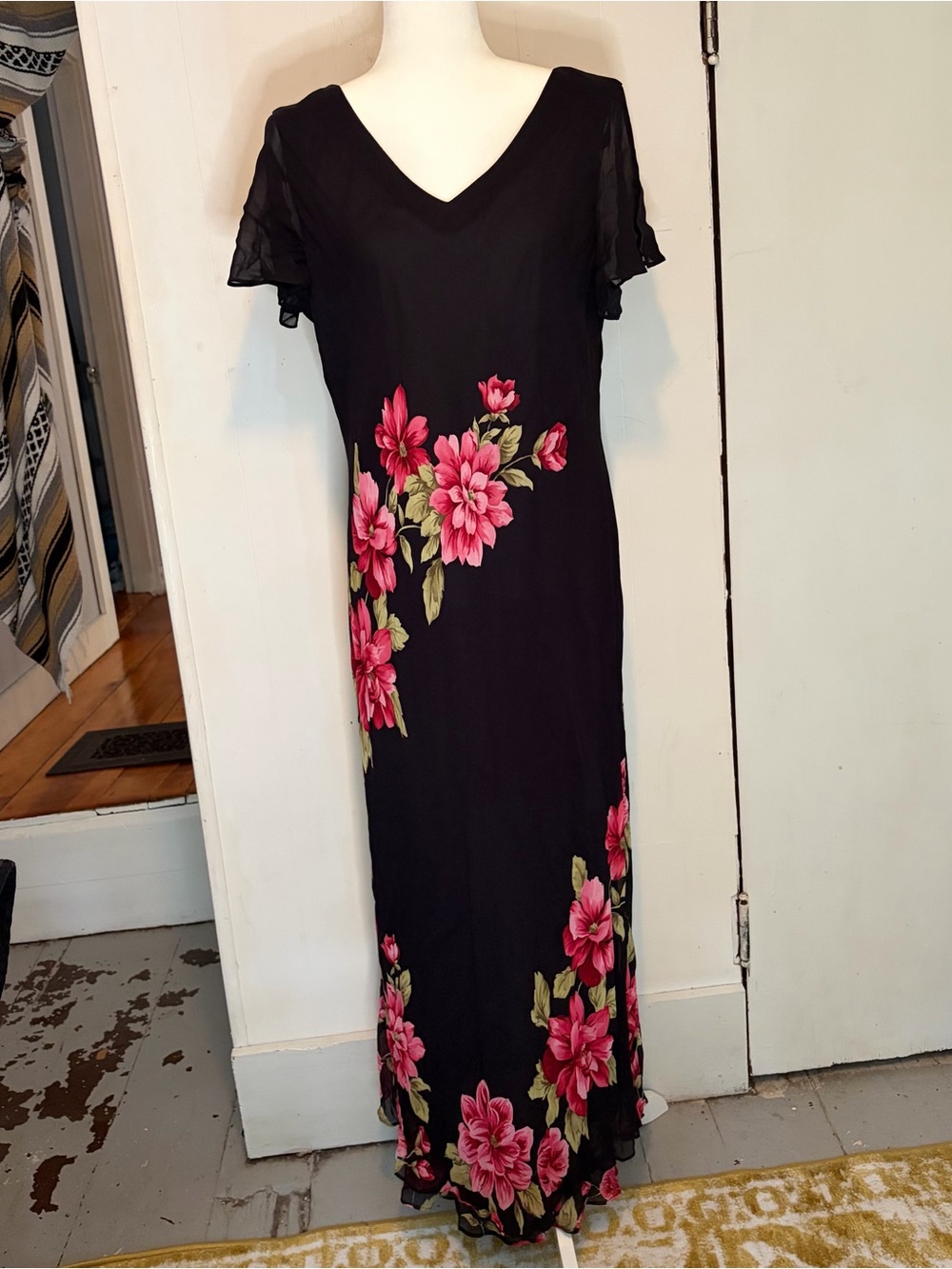 Chiffon black maxi bias cut dress with pink floral pattern and flowy sleeves